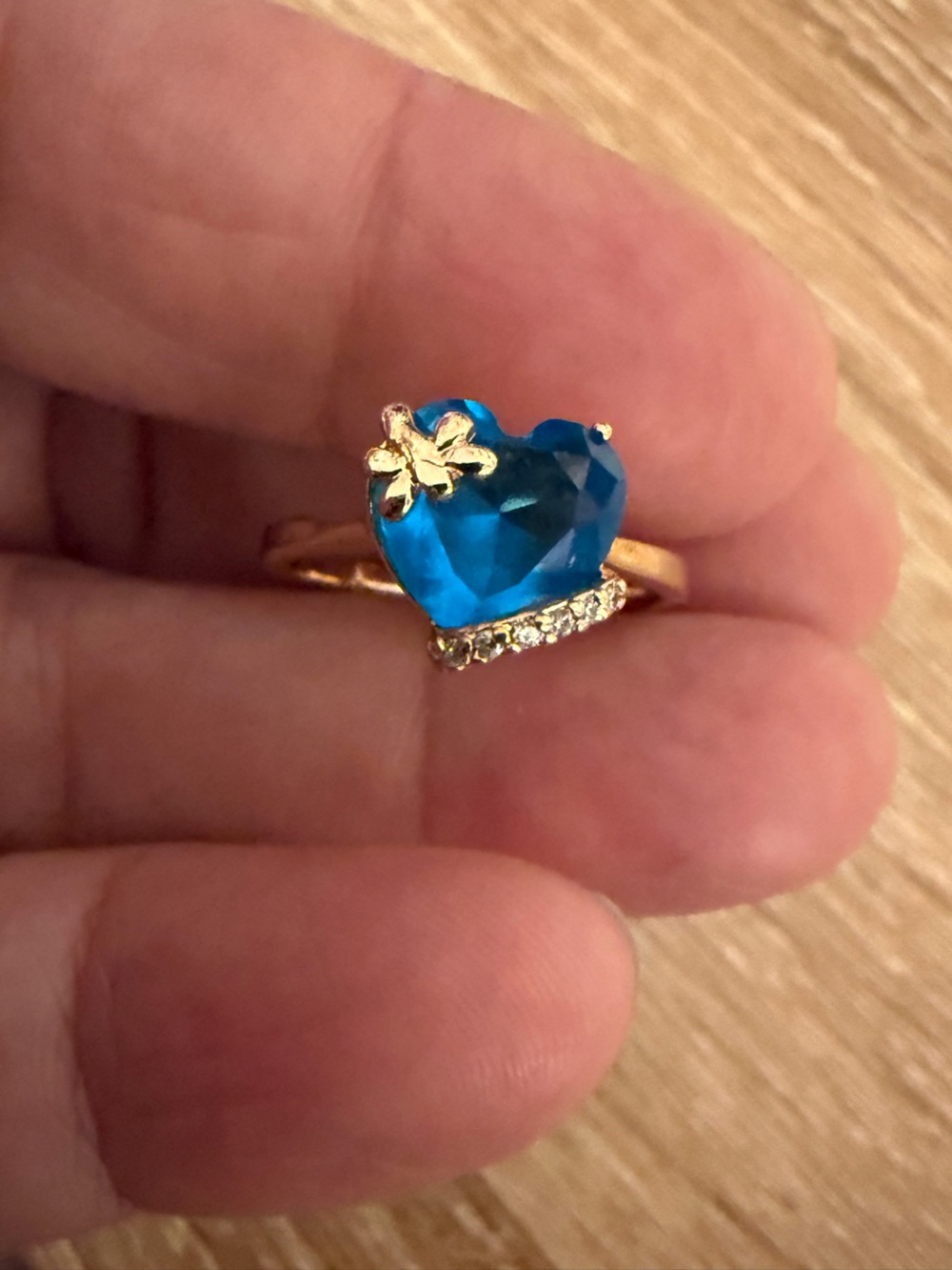 Gold Ring with Blue Heart Gem and Flower Accent